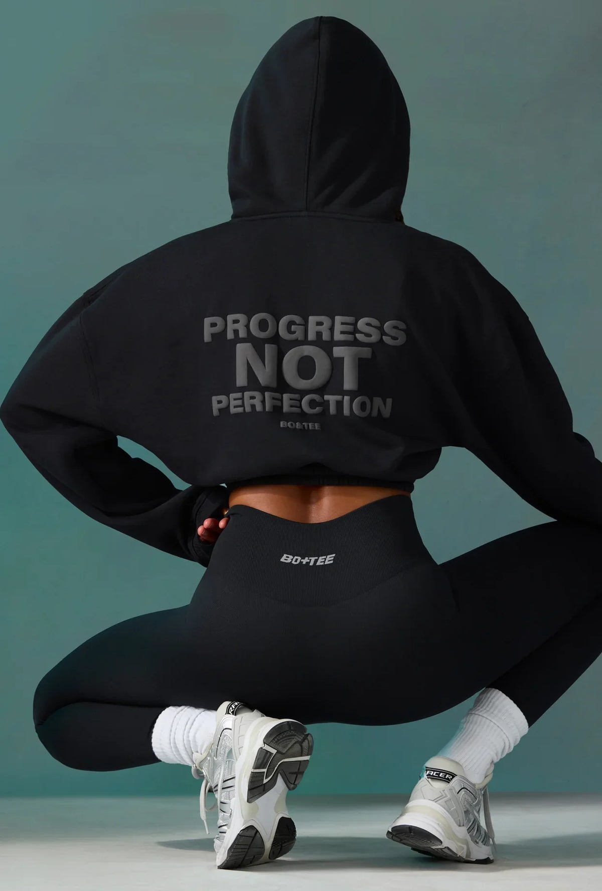 Cropped Drawstring Hooded Sweatshirt In Black
