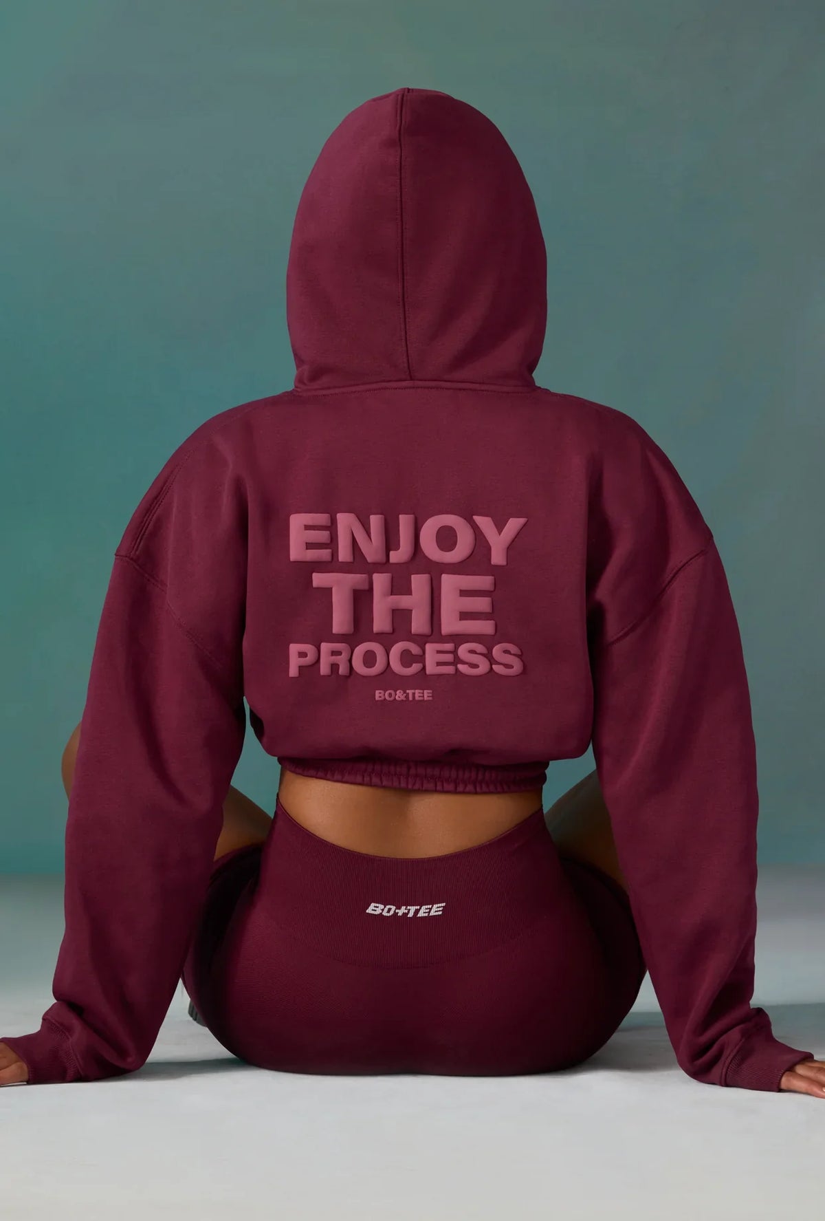 Cropped Drawstring Hooded Sweatshirt In Plum